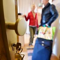Welcome home: A host shows an Airbnb guest to his room in Berlin. There are now more than 21,000 properties in Japan advertised on the Airbnb website, but the legality of homeowners and even renters letting out rooms to strangers remains murky. Airbnb: Will Japan kill the golden goose?