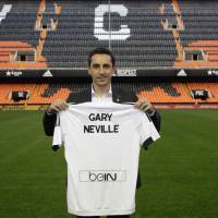 Gary Neville is introduced as Valencia's new manager earlier this week. Valencia's hiring of Neville as manager most unusual