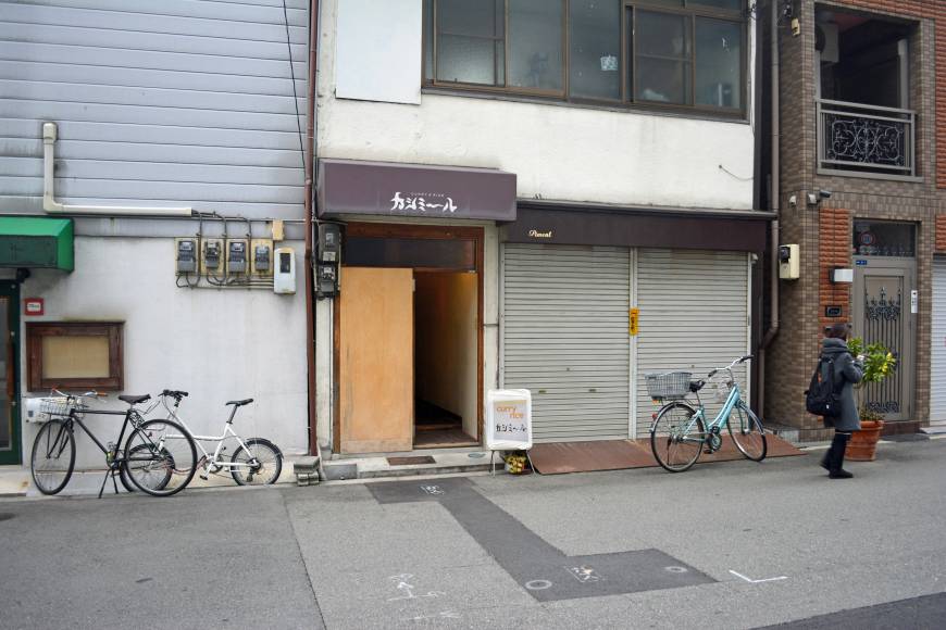 Kashmir No fuss: The entrance to one of Osaka's best curry restaurants is exceptionally modest. | J.J. O'DONOGHUE