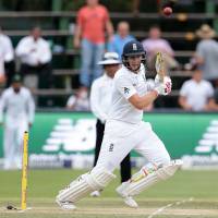 England's Joe Root plays a shot during the second day of the third test match between South Africa and England in Johannesburg on Friday. Root's century leads England in third test
