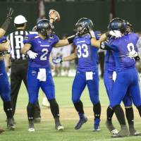 Panasonic players begin to celebrate in the final seconds of their 22-19 victory over Ritsumeikan in the Rice Bowl on Sunday at Tokyo Dome. Panasonic prevails in thriller to capture Rice Bowl crown