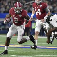 Alabama running back Derrick Henry (2) runs past Michigan State defensive end Shilique Calhoun (89) on his way to the end zone on Thursday in Arlington, Texas. No. 2 Alabama dominates No. 3 Michigan State in Cotton Bowl