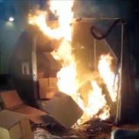 A video screen shot shows a fire raging in a cargo container packed with 5,000 lithium-ion batteries. The test was conducted in April 2014 by the U.S. Federal Aviation Administration in Atlantic City, New Jersey. Lithium batteries should not travel as airline cargo, U.N. panel decrees