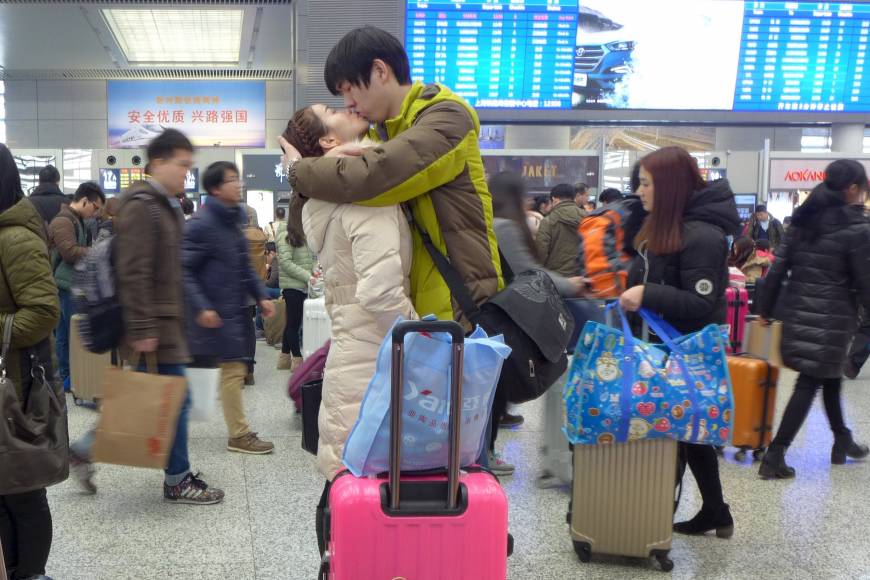 Display of affection: A couple kisses at Hongqiao Railway Station in Shanghai just before departing for Chinese New Year holidays. Take advantage of the quieter atmosphere this Valentine