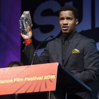 Well deserved: Nate Parker, the star, director and producer of The Birth of a Nation, holds the U.S. Dramatic Audience Award for the film during the Sundance Film Festival Awards Ceremony in Park City, Utah, on Saturday. From SAG Awards to Sundance, diversity makes a comeback