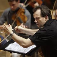 Bostonian rhapsody: Boston Symphony Orchestra music director Andris Nelsons leads rehearsals at Symphony Hall in Boston. Boston Symphony is rhapsodizing over its orchestral Grammy