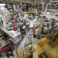 This Dec. 10, 2015, file photo shows the nuclear fusion research center at the Max Planck Institute for Plasma Physics where the first plasma has been produced at the Wendelstein 7-X in Greifswald, Germany. Scientists to inject fuel in experimental fusion device in Germany
