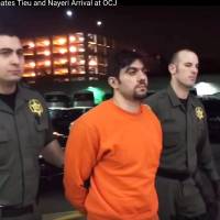 In this still frame from video provided by the Orange County Sheriff's Department, deputies escort Hossein Nayeri back to the Central Men's jail in Santa Ana, California, in the early morning hours of Sunda. Authorities suspect Nayeri was the mastermind of the breakout in which three inmates escaped. With California escapees' recapture, probe to focus on how they broke out