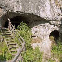 The entrance to Denisova Cave in the Altai Mountains in southern Siberia near the Russia-Mongolia border where the remains of a female Neanderthal were found is shown in this 2011 photo released Wednesday. A new study has found that her genome contained DNA from Homo sapiens, indicating that our species had interbred with Neanderthals about 100,000 years ago. Neanderthal DNA reveals Homo sapiens mated out of Africa way earlier than thought