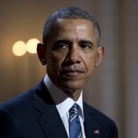 President Barack Obama pauses as he and first lady Michelle Obama host the In Performance at the White House series in the East Room of the White House, in Washington, Wednesday. Obama signed a bill Wednesday that includes a provision banning U.S. imports of fish caught by slaves in Southeast Asia, gold mined by children in Africa and garments sewn by abused women in Bangladesh, closing a loophole in an 85-year-old tariff law that has failed to keep products of forced and child labor out of America. Thai seafood put on notice as Obama bans imports of slave-made goods