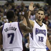 Forward Omri Casspi (right) is averaging 12.3 points and 6.4 rebounds per game this season for the Sacramento Kings. Casspi becomes NBA's first star from Israel