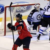 The Panthers' Jaromir Jagr celebrates after scoring against the Jets during the third period of their game on Saturday. Jagr moves up scoring list in Panthers win