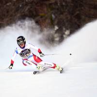 Switzerland's Lara Gut competes in a World Cup downhill in La Thuile, Italy, on Friday. Gut won in a time of 1 minute, 35.37 seconds. Gut retakes World Cup lead as Vonn crashes out