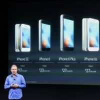 Greg Joswiak, vice president of iPod, iPhone and iOS product marketing for Apple Inc., announces the iPhone SE smartphone during an Apple event in Cupertino, California, Monday, AppleChief Executive Officer Tim Cook unveiled a smaller iPhone Monday in attempt to woo those who are holding onto older versions. Apple unveils small new iPhone, iPad, price cuts; Cook stands firm on FBI showdown
