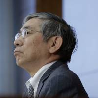 Bank of Japan Gov. Haruhiko Kuroda pauses during a news conference at the central bank’s headquarters in Tokyo on Tuesday. BOJ policymakers in heated debate over negative interest rate: minutes