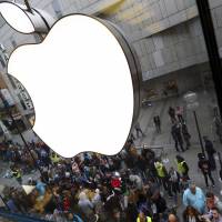 People wait in front of an Apple store last September in Munich before the worldwide launch of the iPhone 6s. The government's fight with Apple over an encrypted iPhone may be the first of many battles in a broader war over who gets access to individuals' data, as more tech companies offer encrypted messaging and other services. Apple-FBI fight seen as just first salvo in bigger war over encryption as privacy demands mount