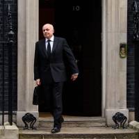 Then-British Work and Pensions Secretary Iain Duncan Smith leaves after attending a pre-Budget cabinet meeting at Downing Street in London on Wednesday. British minister's resignation set to sharpen the EU-exit debate