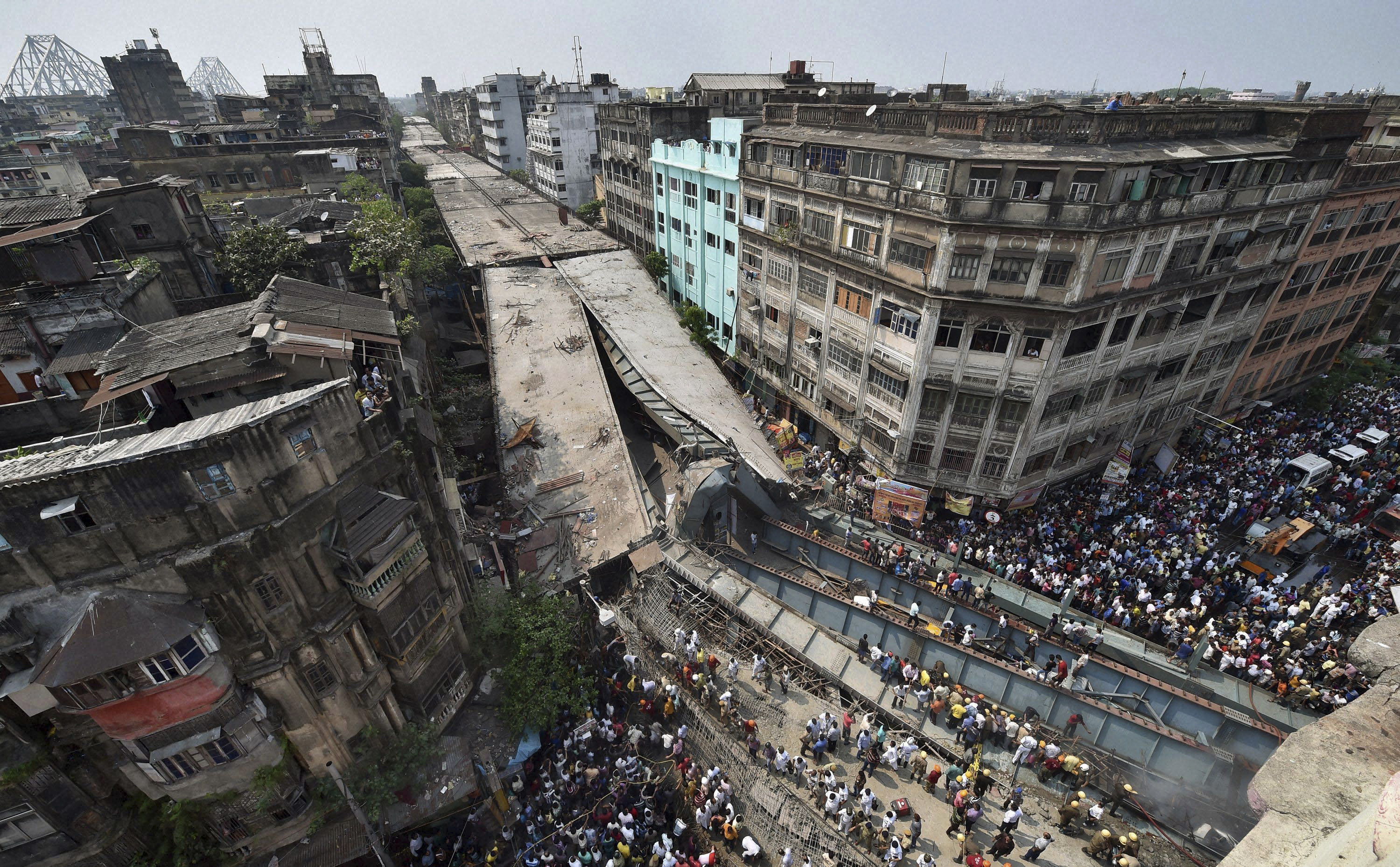 At least 15 killed, many trapped in overpass collapse in India The