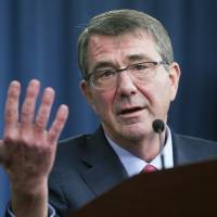 Defense Secretary Ash Carter gestures during a January news conference at the Pentagon. The Pentagon is looking for a few good computer hackers. Screened high-tech specialists will be brought in to try to breach the Defense Department's public Internet pages in a pilot program aimed at finding and fixing cybersecurity vulnerabilities. Americans who clear vetting invited to hack Pentagon websites to probe for weaknesses