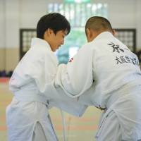 Students attend a judo class in the city of Osaka as part of their extracurricular activities. Overworked teachers call for change as extracurricular supervision takes toll