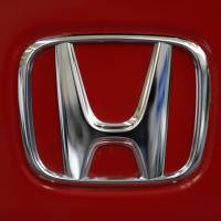 A Honda logo is seen on the trunk of a Honda automobile at the Pittsburgh Auto Show in 2013. The U.S. government has closed an investigation into Honda’s failure to report deaths and injuries, saying that the company has met all of its obligations. NHTSA concludes probe into Honda failure to report deaths, injuries