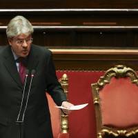 Italian Foreign Minister Paolo Gentiloni gestures as he makes his speech in the Senate in Rome Tuesday. Italy said it would take “immediate and proportionate” measures against Egypt if the Cairo government did not fully cooperate in uncovering the truth over the murder of an Italian student. Italy warns Egypt to come clean on student's torture-slaying, release phone data, footage