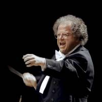 Metropolitan Opera musical director James Levine conducts in Japan in 2001. Longtime Met Opera music director James Levine to retire