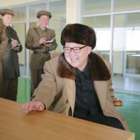 North Korean leader Kim Jong Un watches the test of a new engine for an intercontinental ballistic missile at the Sohae Space Center in North Pyongan province in this undated photo released April 9. North Korea likelier to try another nuclear test following failed missile launch, experts say