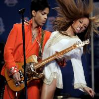 Prince entertains members of the news media in Miami Beach, Florida, in February 2007. Prince's desire for control of own music set example for today's musicians