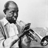 Louis Armstrong practices with his horn at his Corona, New York, home in 1971. The Louis Armstrong House Museum announced Wednesday that it has acquired the only known film footage of the great jazz musician in a recording studio. While many audio recordings of Armstrong’s music exist there has been no video of him working in a recording studio until now. Queens museum lands only known film of 'Satchmo' in studio