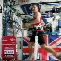 British astronaut Tim Peake runs the London Marathon while strapped to a treadmill to counter the zero gravity on the International Space Station on Sunday. While the official 2016 London Marathon was being run in London, Peake ran 26.2 miles (42 km) on the ISS treadmill in three hours, 35 minutes and 21 seconds while in orbit 250 km above Earth. British astronaut breaks record for marathon in space