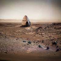 This artist rendering provided by SpaceX shows a Dragon capsule sitting on the surface of Mars. SpaceX is shooting for Mars. The company's billionaire founder and chief executive, Elon Musk, says he plans to send a Dragon capsule to the red planet as early as 2018. Musk aims to land unmanned SpaceX 'Red Dragon' capsule to Mars as early as 2018