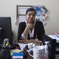 Dying with Dignity Canada CEO Shanaaz Gokool sits in her office following a news conference in response to new federal legislation on physician-assisted dying, in Toronto on Thursday. Canada on Thursday introduced a new assisted suicide law that will apply only to citizens and residents, meaning Americans won’t be able to travel to Canada to die. Canada's new assisted suicide bill only covers those eligible for nation's health services