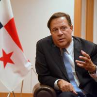 Panamanian President Juan Carlos Varela is interviewed by The Japan Times at the Imperial Hotel in Tokyo on Monday. Panama's president says vilification over tax haven issue is unfair