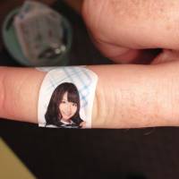 Healing touch: A Band-Aid bearing the likeness of AKB48 member Yuki Kashiwagi is one of many branded items created for the idol group’s predominantly male fan base. Recently AKB’s sister group HKT48 has been criticized for a song with sexist lyrics, which was written by Yasushi Akimoto. Despite this promotion of traditional gender roles in Japan, women often have more agency in relationships than men. Idols put Band-Aids on fragile male egos