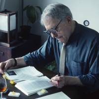 Embedded reflections: Donald Richie in 2004, in his home beside Tokyo’s Ueno Park, overseeing the manuscript of his book “The Japan Journals: 1947-2004.” Donald Richie: The legacy of an entrenched view