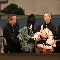 Master class: Kanjuro Kiritake III (left) and Kazuo Yoshida take the leads in the bunraku classic Sonezaki Shinju (The Love Suicides at Sonezaki). Japan's traditional performing arts getting set for the Olympics
