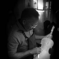 Labor of love: Amadio Arboleda begins varnishing his first violin at Caporale & Ochando's workshop in Yoyogi, Tokyo. Making his first instrument proved to be far more difficult than Arboleda had ever imagined. It took physical endurance and patience, and involved learning a range of new skills. Tokyo violin maker's apprentice fulfills lifetime dream at 81
