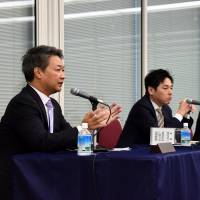 From left: Dassault Systemes K.K. Managing Director Seiji Kajiya, McKinsey & Company’s Chiaki Kato and the University of Tokyo’s Hiroyuki Morikawa answer questions from a moderator and audience members at a symposium organized by the Keizai Koho Center, titled “The Future of Industry (Industry 4.0) and Japan’s Economic Growth,” in Tokyo on March 18. Examining 'Industry 4.0' opportunities
