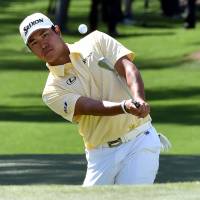 Hideki Matsuyama plays a shot on the seventh hole during the final round of the Masters on Sunday in Augusta, Georgia. Matsuyama fades at Masters