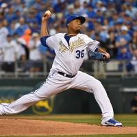 Kansas City's Edison Volquez delivers during the Royals' 4-3 victory over the Mets on Sunday. Royals beat Mets in opening rematch of World Series