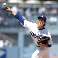 Los Angeles starting pitcher Kenta Maeda delivers during the Dodgers' 4-2 loss to the Diamondbacks on Tuesday. Dodgers bullpen blows Maeda's lead in defeat to D-Backs