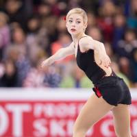 Gracie Gold performs her short program at the world championships on Thursday in Boston. Gold leads heading into Saturday's free skate with 76.43 points. Gold shines in short program; Mao flops