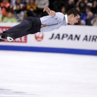 Javier Fernandez performs his free skate on Friday. Fernandez rallies past Hanyu for world title
