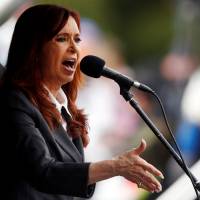 Former Argentine President Cristina Fernandez de Kirchner speaks during a rally outside the Federal Justice building where she attended court in Buenos Aires, in this picture taken April 13. Argentina's Kirchner charged with fraud, assets frozen