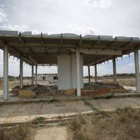 This March 21 photo shows what is left of a structure at a railroad factory that was abandoned by its Chinese managers in Zaraza, Venezuela. Chinese bullet train project in Venezuela stalls as alliance derails