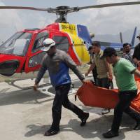 The body of a climber who died during a Mount Everest expedition is carried Thursday to Tribhuvan University Teaching Hospital in Kathmandu. Nearly 300 people have died on Everest since the first expedition in the early 1920s. At least 100 of the failed climbers are still on the mountain. Indian climber's body found on Everest, bringing week's fatality toll to four