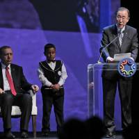 United Nations Secretary-General Ban Ki-moon talks as Turkish President Recep Tayyip Erdogan looks on at the closing ceremony of the World Humanitarian Summit in Istanbul Tuesday. Ban rues G-7 no-shows from landmark Istanbul humanitarian summit