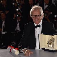 British director Ken Loach poses with his trophy on Sunday during a photocall after winning the Palme d'Or for the film I, Daniel Blake at the 69th Cannes Film Festival in Cannes, southern France. Loach lashes out at 'catastrophe' of EU austerity in accepting Palme d'Or, warns of rise of far-right