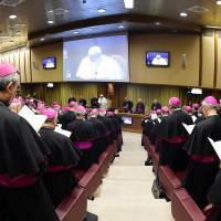 Pope Francis delivers a speech during the opening session of the Italian Bishops' Conference (CEI) at the Vatican on Monday. Shocked by girl's slaying, pope decries pedophilia but rules out French cardinal's ouster for keeping quiet